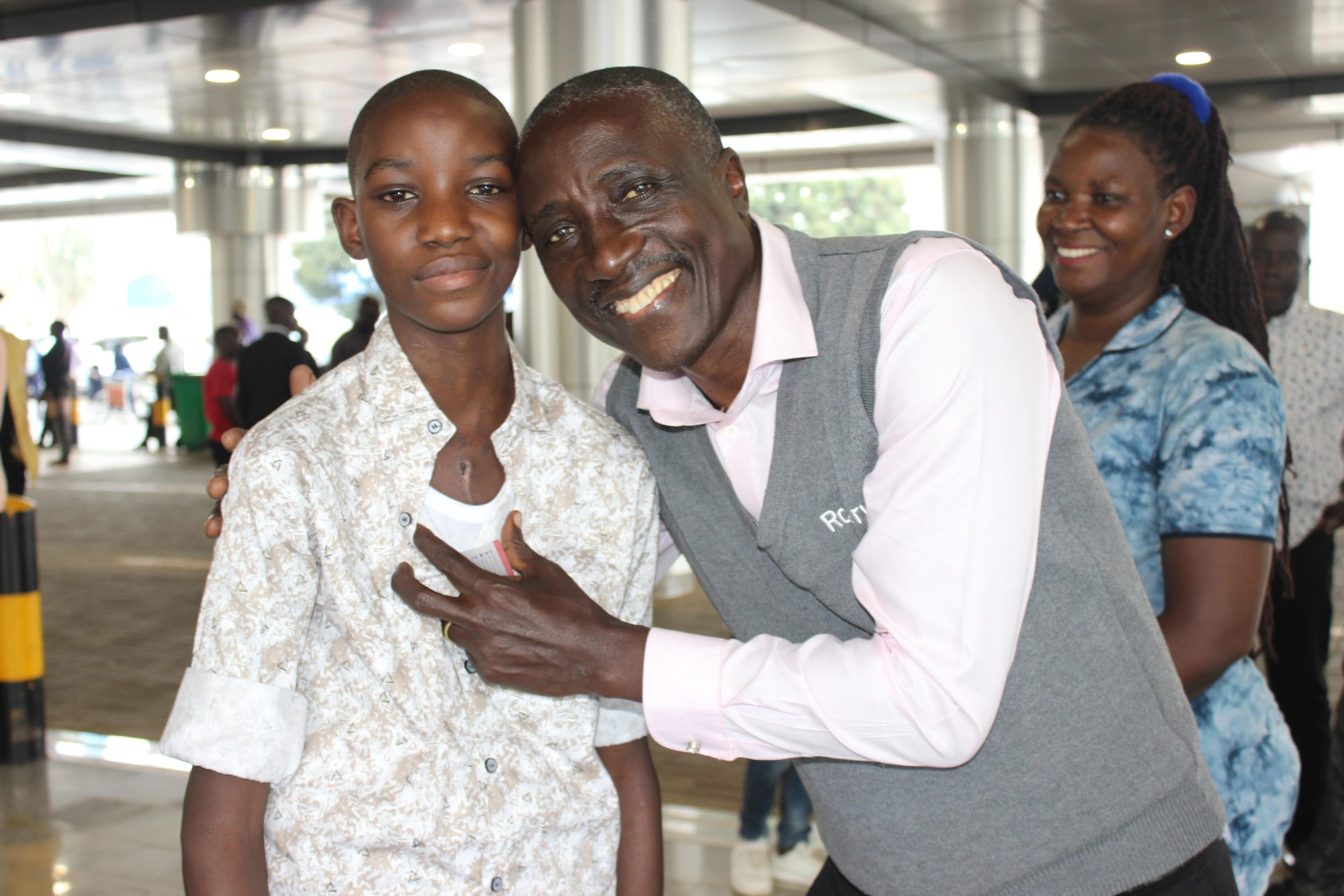 ACDIPE Staff with one of the children